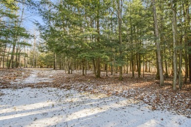 Prepare to fall in love with this captivating 5-bedroom on Canadian Lakes Country Club-The Royal Course in Michigan - for sale on GolfHomes.com, golf home, golf lot