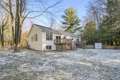 Prepare to fall in love with this captivating 5-bedroom on Canadian Lakes Country Club-The Royal Course in Michigan - for sale on GolfHomes.com, golf home, golf lot