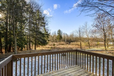 Prepare to fall in love with this captivating 5-bedroom on Canadian Lakes Country Club-The Royal Course in Michigan - for sale on GolfHomes.com, golf home, golf lot