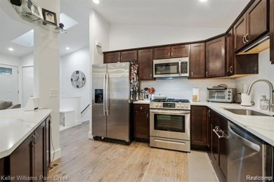 Step into a beautifully updated condo in Clinton Township, where on Fern Hill Country Club in Michigan - for sale on GolfHomes.com, golf home, golf lot