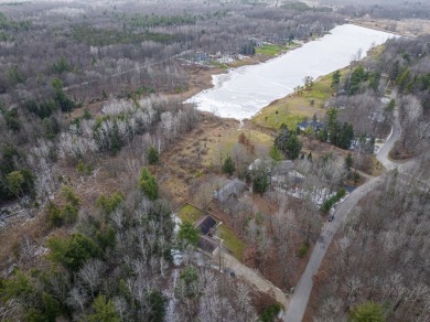 Prepare to fall in love with this captivating 5-bedroom on Canadian Lakes Country Club-The Royal Course in Michigan - for sale on GolfHomes.com, golf home, golf lot