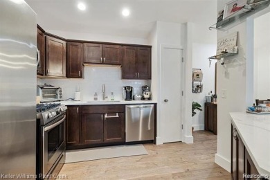 Step into a beautifully updated condo in Clinton Township, where on Fern Hill Country Club in Michigan - for sale on GolfHomes.com, golf home, golf lot