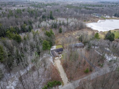 Prepare to fall in love with this captivating 5-bedroom on Canadian Lakes Country Club-The Royal Course in Michigan - for sale on GolfHomes.com, golf home, golf lot