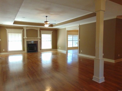 Spacious home that features 4 bedrooms & 2 1/2 baths, Tile in on The Country Club of Arkansas in Arkansas - for sale on GolfHomes.com, golf home, golf lot