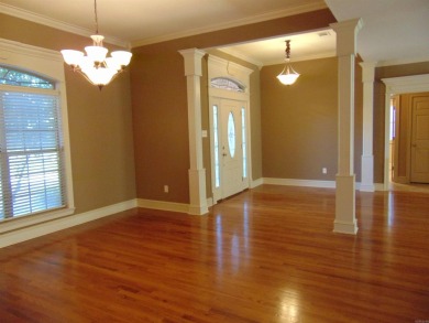 Spacious home that features 4 bedrooms & 2 1/2 baths, Tile in on The Country Club of Arkansas in Arkansas - for sale on GolfHomes.com, golf home, golf lot