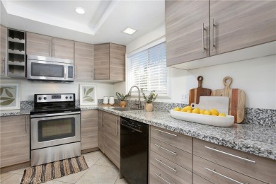 This beautifully upgraded upper-unit condominium is located in on Tustin Ranch Golf Club in California - for sale on GolfHomes.com, golf home, golf lot