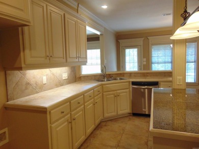 Spacious home that features 4 bedrooms & 2 1/2 baths, Tile in on The Country Club of Arkansas in Arkansas - for sale on GolfHomes.com, golf home, golf lot
