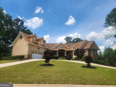 Welcome to your dream home-a true Southern Charmer nestled in on Eagles Landing Country Club in Georgia - for sale on GolfHomes.com, golf home, golf lot