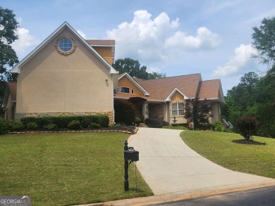 Welcome to your dream home-a true Southern Charmer nestled in on Eagles Landing Country Club in Georgia - for sale on GolfHomes.com, golf home, golf lot