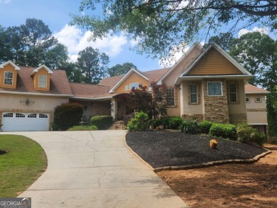 Welcome to your dream home-a true Southern Charmer nestled in on Eagles Landing Country Club in Georgia - for sale on GolfHomes.com, golf home, golf lot