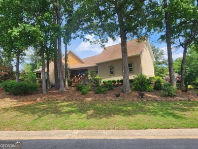 Welcome to your dream home-a true Southern Charmer nestled in on Eagles Landing Country Club in Georgia - for sale on GolfHomes.com, golf home, golf lot