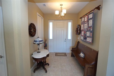 Welcome to this beautiful 2014, 4 bedroom, 3 bath home that has on Twin Isles Country Club in Florida - for sale on GolfHomes.com, golf home, golf lot