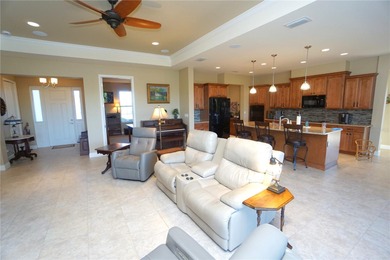 Welcome to this beautiful 2014, 4 bedroom, 3 bath home that has on Twin Isles Country Club in Florida - for sale on GolfHomes.com, golf home, golf lot