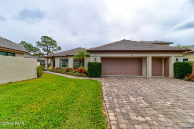Enjoy this beautifully landscaped, energy efficient, 2-bedroom on Spruce Creek Golf Club in Florida - for sale on GolfHomes.com, golf home, golf lot