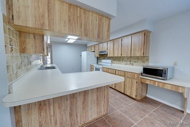 Welcome to this charming 3-bedroom, 3-bath home nestled near on Inverness Golf and Country Club in Florida - for sale on GolfHomes.com, golf home, golf lot