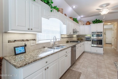 This incredible golf course offers lovely views of the course on Sound Golf Links at Albemarle Plantation in North Carolina - for sale on GolfHomes.com, golf home, golf lot