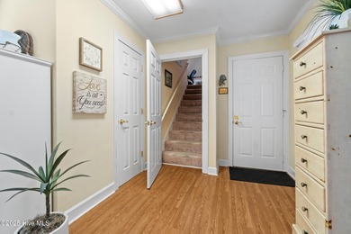 This incredible golf course offers lovely views of the course on Sound Golf Links at Albemarle Plantation in North Carolina - for sale on GolfHomes.com, golf home, golf lot