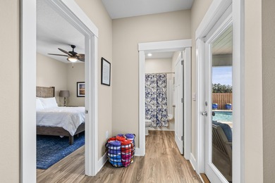 Waiting for a POOL HOME in the Tiger Point Area of Gulf Breeze? on Tiger Point Golf and Country Club in Florida - for sale on GolfHomes.com, golf home, golf lot