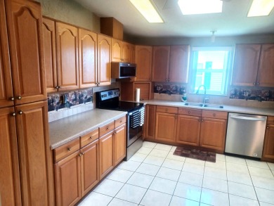 Listed by the Official Sales Team of Cypress Lakes Village on Big Cypress Golf and Country Club in Florida - for sale on GolfHomes.com, golf home, golf lot