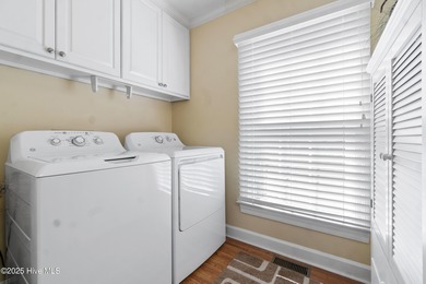 This incredible golf course offers lovely views of the course on Sound Golf Links at Albemarle Plantation in North Carolina - for sale on GolfHomes.com, golf home, golf lot