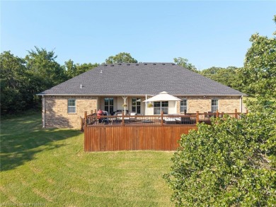 A rare offering in Greenwood-combining location, land, and on Vache-Grasse Country Club in Arkansas - for sale on GolfHomes.com, golf home, golf lot