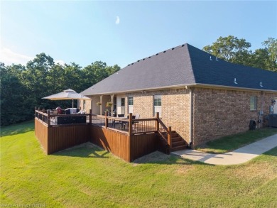 A rare offering in Greenwood-combining location, land, and on Vache-Grasse Country Club in Arkansas - for sale on GolfHomes.com, golf home, golf lot