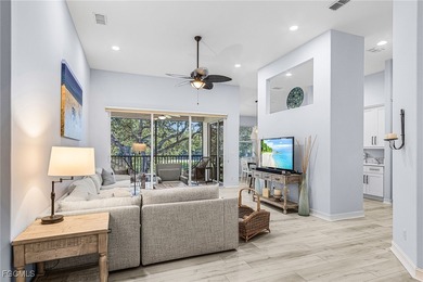 Step into this pristine second-floor coach home in Pelican Sound on  in Florida - for sale on GolfHomes.com, golf home, golf lot