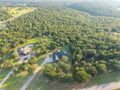 A rare offering in Greenwood-combining location, land, and on Vache-Grasse Country Club in Arkansas - for sale on GolfHomes.com, golf home, golf lot