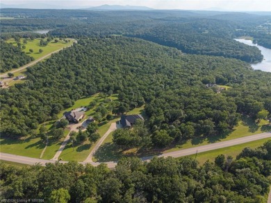 A rare offering in Greenwood-combining location, land, and on Vache-Grasse Country Club in Arkansas - for sale on GolfHomes.com, golf home, golf lot