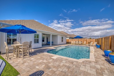 Waiting for a POOL HOME in the Tiger Point Area of Gulf Breeze? on Tiger Point Golf and Country Club in Florida - for sale on GolfHomes.com, golf home, golf lot