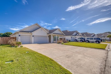 Waiting for a POOL HOME in the Tiger Point Area of Gulf Breeze? on Tiger Point Golf and Country Club in Florida - for sale on GolfHomes.com, golf home, golf lot