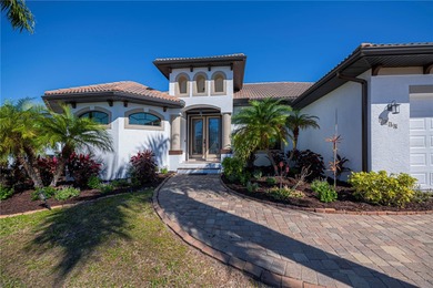 STUNNING MANICURED GOLF COURSE and TRANQUIL LAKE VIEWS await you on Saint Andrews South Golf Club in Florida - for sale on GolfHomes.com, golf home, golf lot