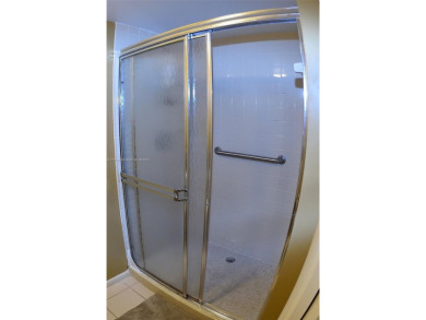 Price Improvement on this spacious top floor 2 bedroom condo in on The Country Club At Boca Raton in Florida - for sale on GolfHomes.com, golf home, golf lot