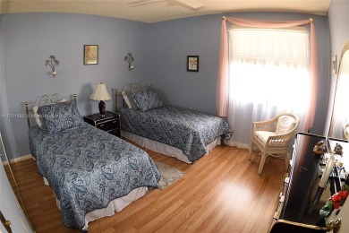 Price Improvement on this spacious top floor 2 bedroom condo in on The Country Club At Boca Raton in Florida - for sale on GolfHomes.com, golf home, golf lot