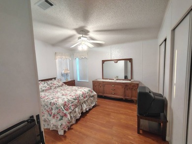 Welcome to this 3-bedroom 2-bath oasis!!! Lot Rent includes all on Spanish Lakes Fairways in Florida - for sale on GolfHomes.com, golf home, golf lot