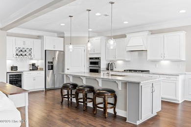 Experience the perfect blend of luxury, privacy, and coastal on Crow Creek Golf Club in North Carolina - for sale on GolfHomes.com, golf home, golf lot