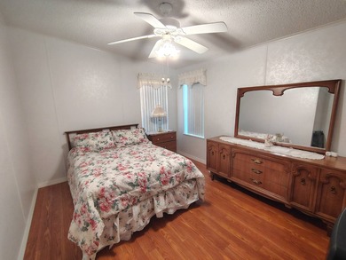 Welcome to this 3-bedroom 2-bath oasis!!! Lot Rent includes all on Spanish Lakes Fairways in Florida - for sale on GolfHomes.com, golf home, golf lot