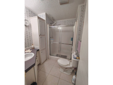 Welcome to this 3-bedroom 2-bath oasis!!! Lot Rent includes all on Spanish Lakes Fairways in Florida - for sale on GolfHomes.com, golf home, golf lot