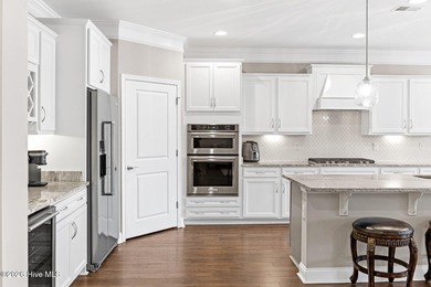 Experience the perfect blend of luxury, privacy, and coastal on Crow Creek Golf Club in North Carolina - for sale on GolfHomes.com, golf home, golf lot