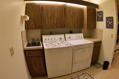 Price Improvement on this spacious top floor 2 bedroom condo in on The Country Club At Boca Raton in Florida - for sale on GolfHomes.com, golf home, golf lot