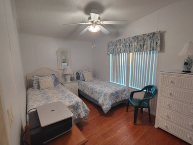 Welcome to this 3-bedroom 2-bath oasis!!! Lot Rent includes all on Spanish Lakes Fairways in Florida - for sale on GolfHomes.com, golf home, golf lot