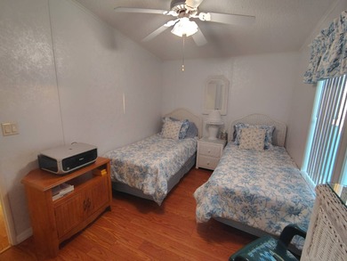 Welcome to this 3-bedroom 2-bath oasis!!! Lot Rent includes all on Spanish Lakes Fairways in Florida - for sale on GolfHomes.com, golf home, golf lot