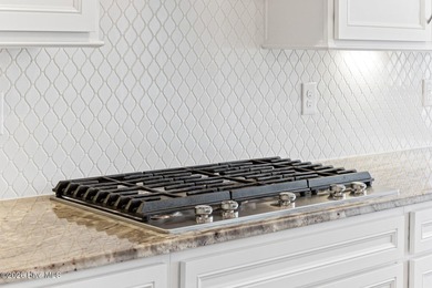 Experience the perfect blend of luxury, privacy, and coastal on Crow Creek Golf Club in North Carolina - for sale on GolfHomes.com, golf home, golf lot