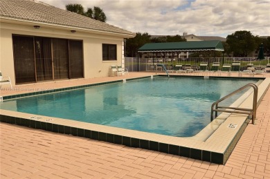 Price Improvement on this spacious top floor 2 bedroom condo in on The Country Club At Boca Raton in Florida - for sale on GolfHomes.com, golf home, golf lot