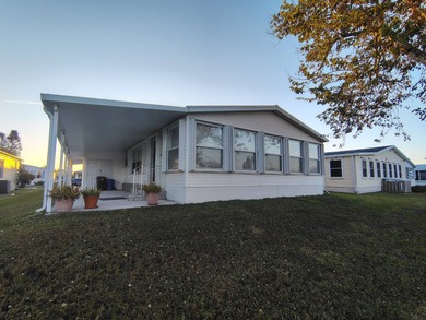 Welcome to this 3-bedroom 2-bath oasis!!! Lot Rent includes all on Spanish Lakes Fairways in Florida - for sale on GolfHomes.com, golf home, golf lot