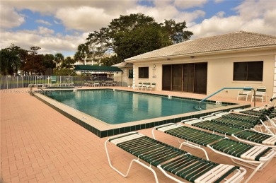 Price Improvement on this spacious top floor 2 bedroom condo in on The Country Club At Boca Raton in Florida - for sale on GolfHomes.com, golf home, golf lot