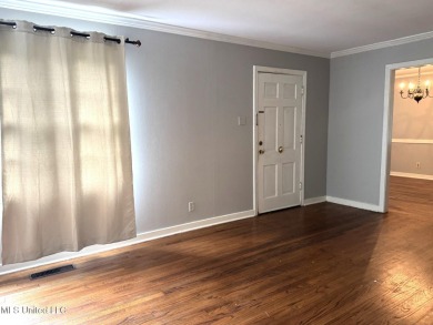 NEW TO THE MARKET IS THIS 3 BEDROOM, 2 BATH HOME JUST ONE BLOCK on Duncan Park Golf Course in Mississippi - for sale on GolfHomes.com, golf home, golf lot