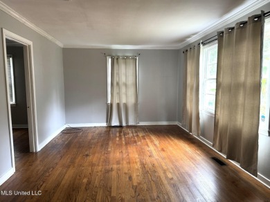 NEW TO THE MARKET IS THIS 3 BEDROOM, 2 BATH HOME JUST ONE BLOCK on Duncan Park Golf Course in Mississippi - for sale on GolfHomes.com, golf home, golf lot