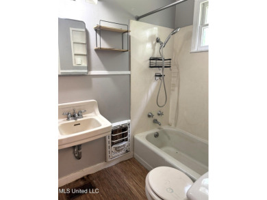 NEW TO THE MARKET IS THIS 3 BEDROOM, 2 BATH HOME JUST ONE BLOCK on Duncan Park Golf Course in Mississippi - for sale on GolfHomes.com, golf home, golf lot