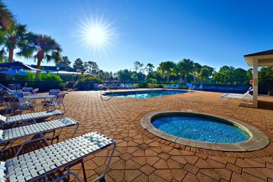 This high and dry lot overlooks a pond and the 12th green on St. James Bay in Florida - for sale on GolfHomes.com, golf home, golf lot
